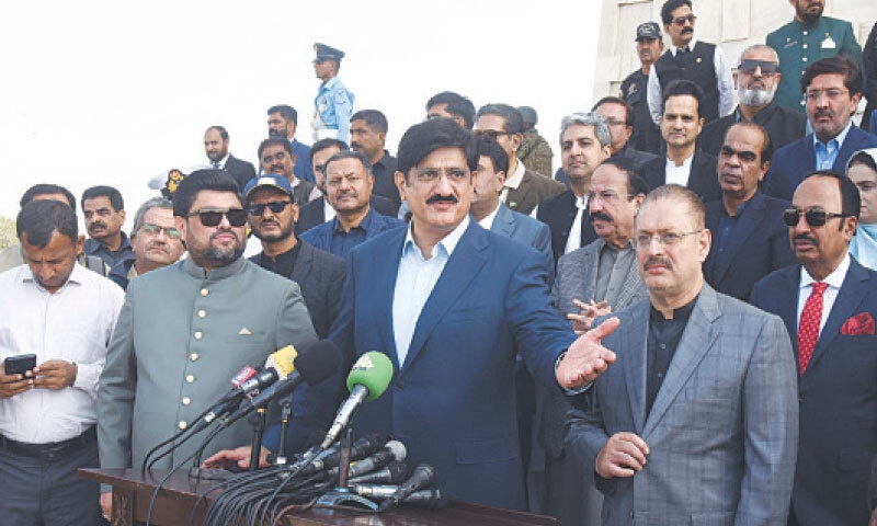 Chief Minister Murad Ali Shah speaks, alongside Sindh Governor Kamran Tessori and Senior Minister Sharjeel Memon, after offering fateha at Mazar-i-Quaid. &mdash;Dawn
