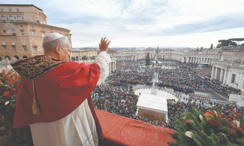 Pope Leo XIV waves from the main balcony of St. Peter’s Basilica.—AFP Pope Leo XIV waves from the main balcony of St. Peter’s Basilica.—AFP