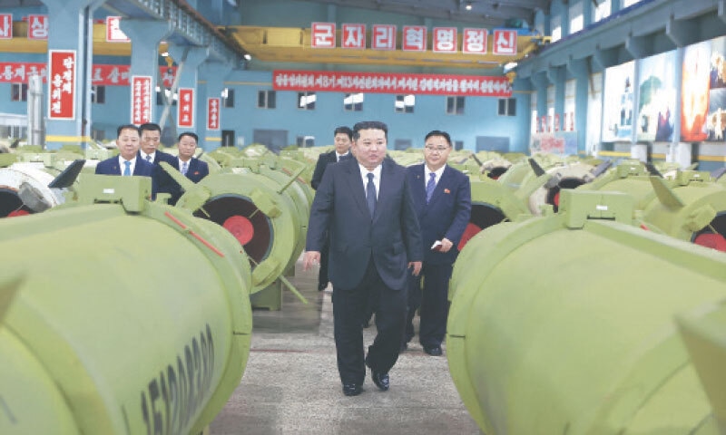 THIS picture, released by the state-run Korean Central News Agency, shows North Korean leader Kim Jong Un visiting major munitions industry enterprises.&mdash;AFP