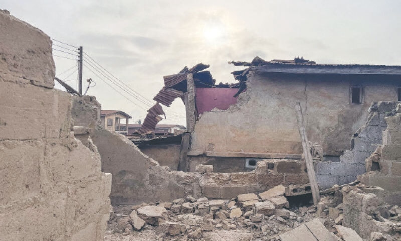 A general view of destroyed structures caused by debris from expended munitions that fell from US strikes.—AFP A general view of destroyed structures caused by debris from expended munitions that fell from US strikes.—AFP
