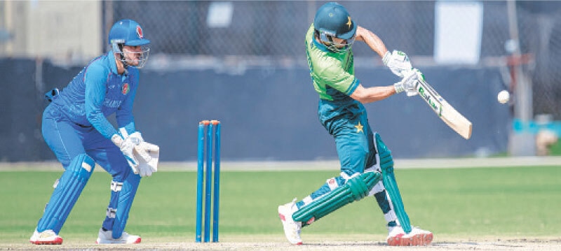 PAKISTAN captain Farhan Yousaf plays a shot as Afghanistan skipper Mahboob Khan looks on during the ODI tri-series match at the Harare Sports Club on Saturday.&mdash;Courtesy Zimbabwe Cricket
