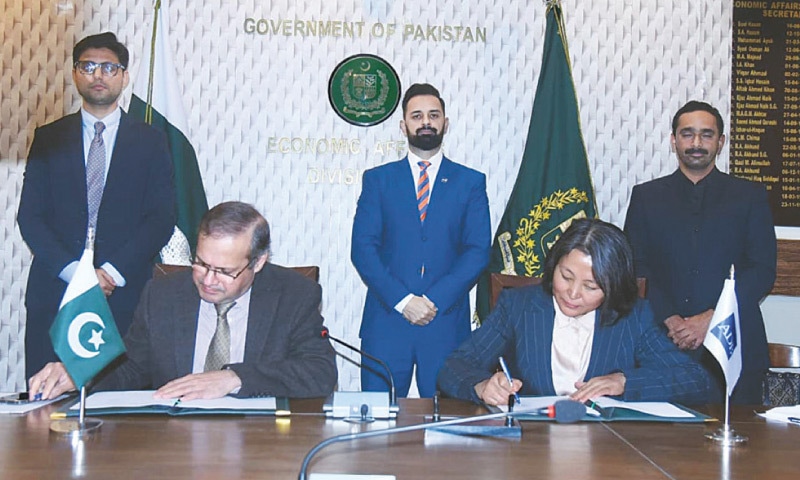 EAD Secretary Muhammad Humair Karim and ADB Country Director Emma Fan sign the agreement.—APP EAD Secretary Muhammad Humair Karim and ADB Country Director Emma Fan sign the agreement.—APP