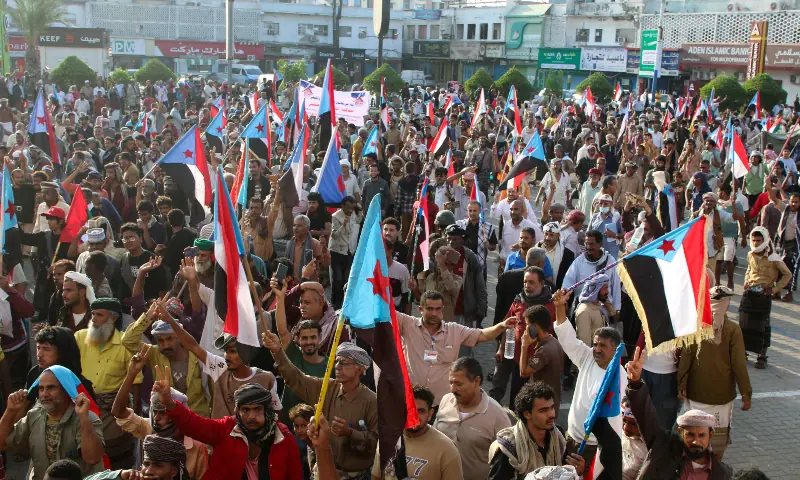ADEN: Supporters of the Southern Transitional Council wave flags during a rally. &mdash; Reuters