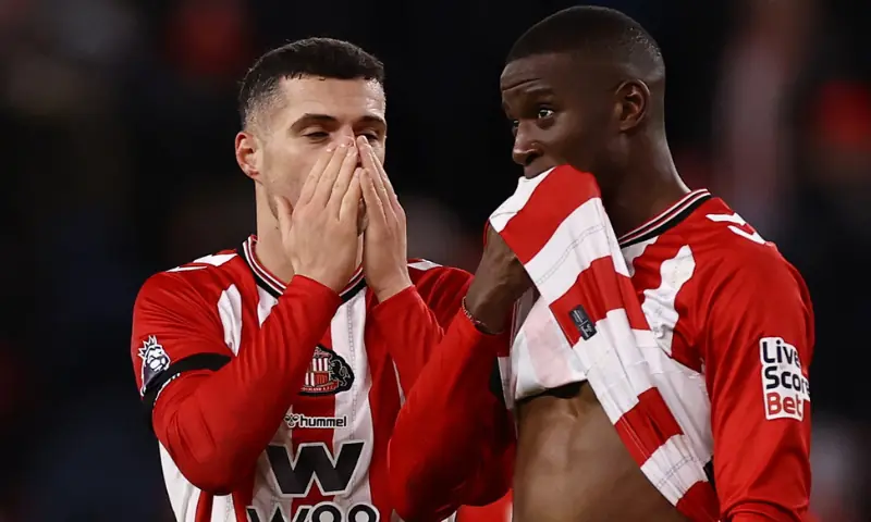 Premier League - Sunderland v Manchester City - Stadium of Light, Sunderland, Britain - January 1, 2026 Sunderland’s Granit Xhaka reacts with Nordi Mukiele after the match Premier League - Sunderland v Manchester City - Stadium of Light, Sunderland, Britain - January 1, 2026 Sunderland’s Granit Xhaka reacts with Nordi Mukiele after the match