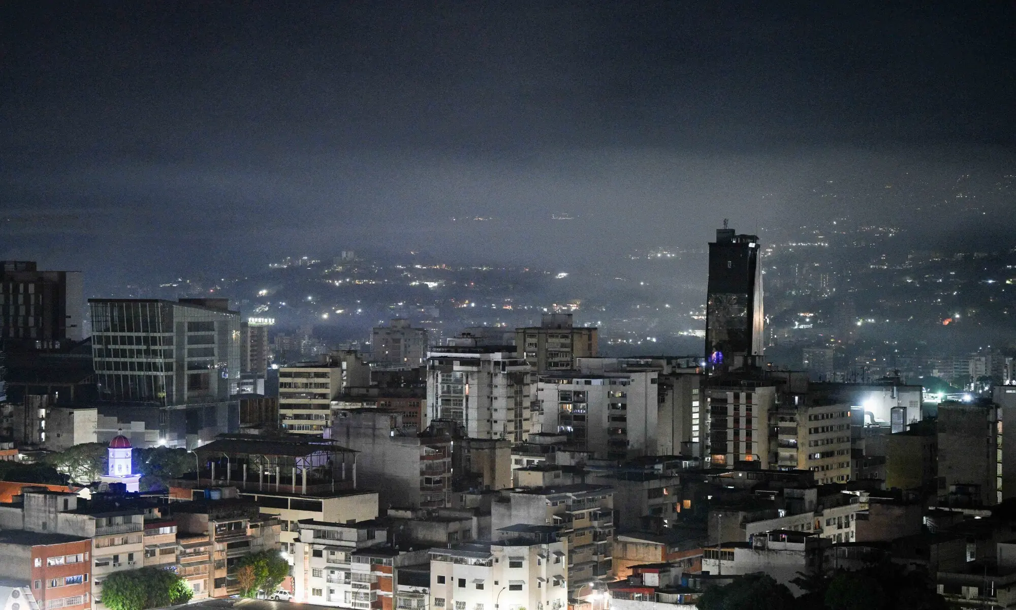 Night view of Caracas taken after a series of explosions heard on January 3, 2026. &mdash; AFP