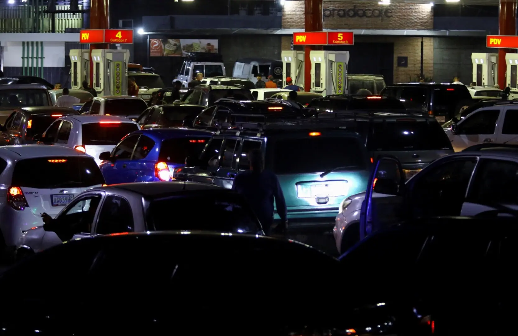 Cars stand in lines for fuel at a gas station, after U.S. President Donald Trump said on Saturday the U.S. has struck Venezuela and captured its President Nicolas Maduro, in Valencia, Venezuela January 3, 2026. —Reuters
