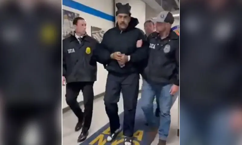 Screengrab from a video posted by White House of Venezuelan President Nicolas Maduro, handcuffed and in sandals, escorted by federal agents through a US Drug Enforcement Administration facility in New York. &mdash; Screengrab via video on Rapid Response 47/X