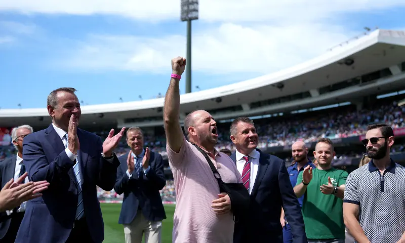 Bondi beach hero Ahmed al Ahmed and first responders react on the field during a presentation to the crowd before the start of play, at the Sydney Cricket Ground, Sydney, Australia on January 4, 2026. &mdash; Reuters