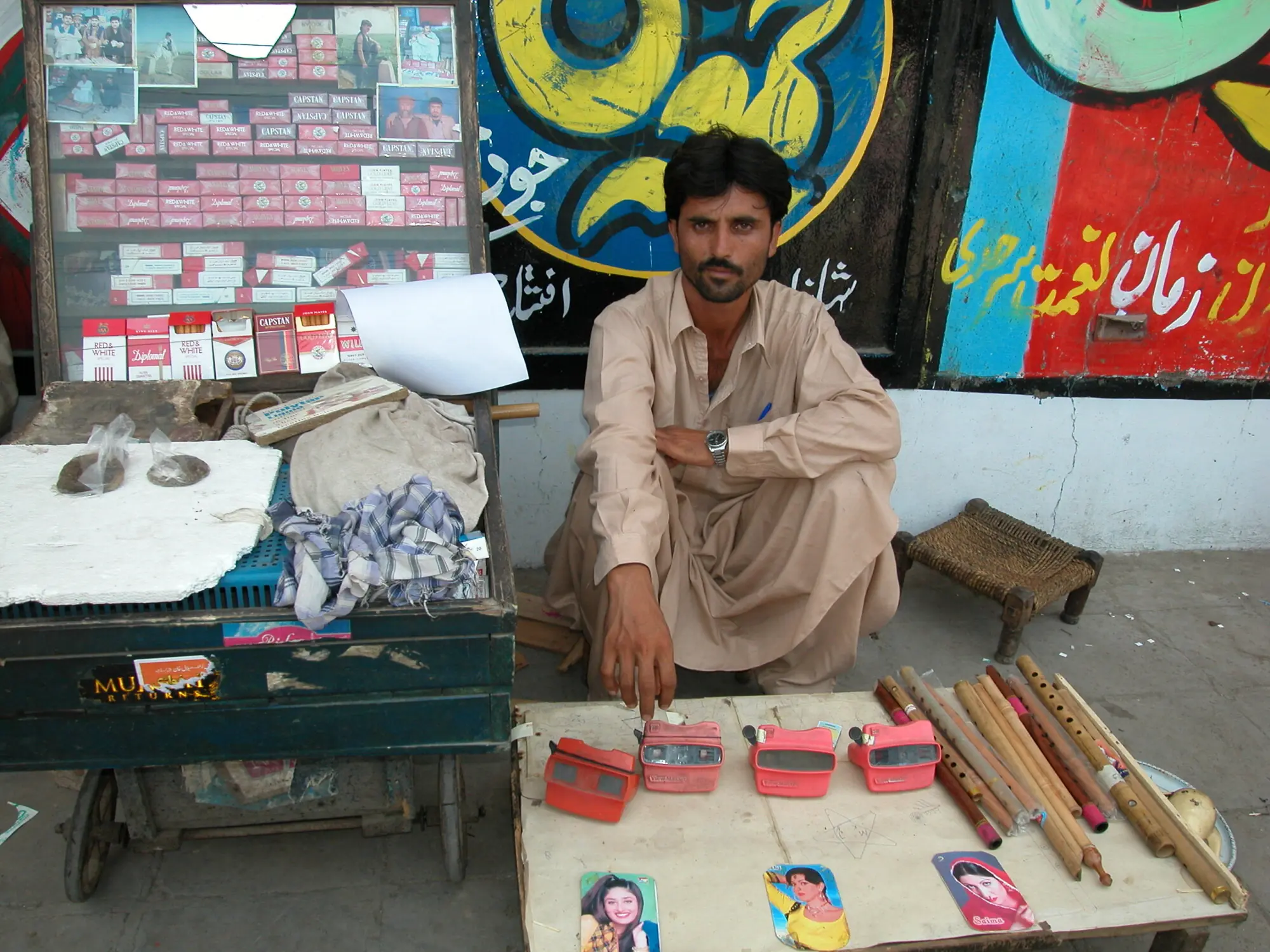 A vendor on Peshawar’s Cinema Road pictured 30 years ago.