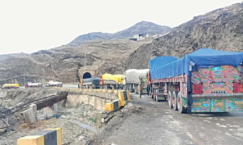 Goods trucks are parked on a road leading to the Torkham border crossing, on Monday.— Photo by Ibrahim Shinwari Goods trucks are parked on a road leading to the Torkham border crossing, on Monday.— Photo by Ibrahim Shinwari