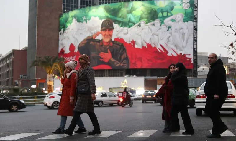 People walk on a street as protests erupt over the collapse of the currency’s value in Tehran, Iran, on January 2, 2026. — Reuters People walk on a street as protests erupt over the collapse of the currency’s value in Tehran, Iran, on January 2, 2026. — Reuters