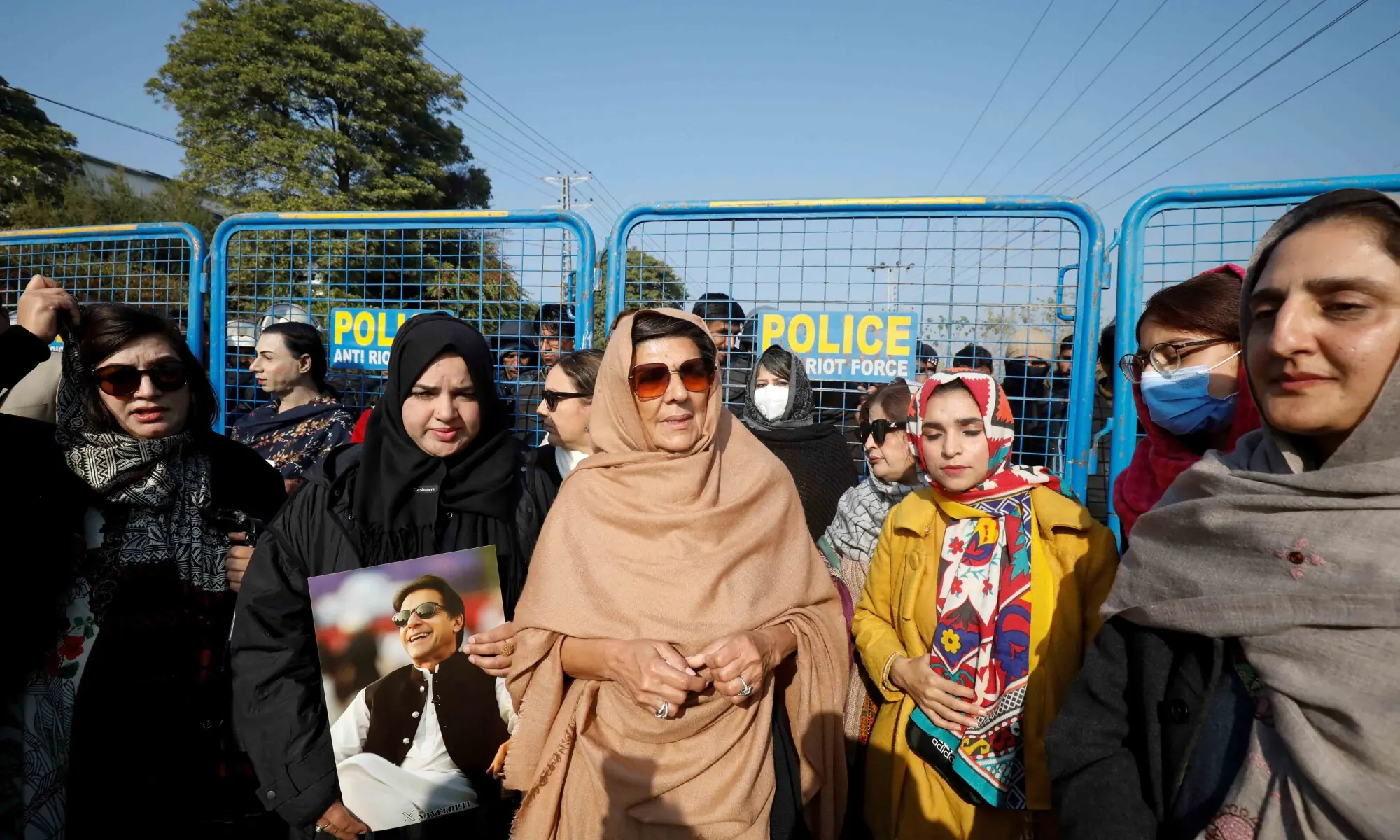 Aleema Khanum, sister of jailed former Prime Minister of Pakistan and leader of Pakistan Tehreek-e-Insaf (PTI) party Imran Khan, along with supporters, take part in a protest on a road leading to Adiala jail in Rawalpindi, Pakistan, January 6, 2026. — Reuters Aleema Khanum, sister of jailed former Prime Minister of Pakistan and leader of Pakistan Tehreek-e-Insaf (PTI) party Imran Khan, along with supporters, take part in a protest on a road leading to Adiala jail in Rawalpindi, Pakistan, January 6, 2026. — Reuters