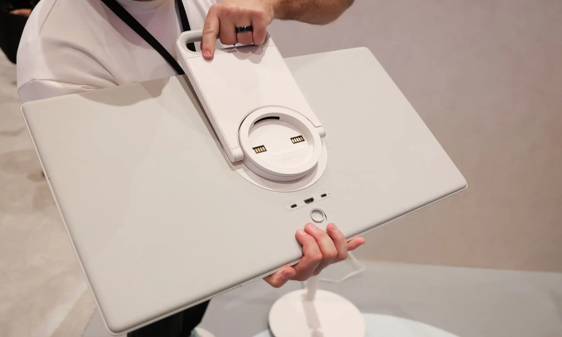 An attendee demonstrates The Moving style portable display and TV during the Samsung Electronics First Look event ahead of the Consumer Electronics Show (CES) in Las Vegas, Nevada, on January 4, 2026. &mdash; Patrick T. Fallon / AFP
