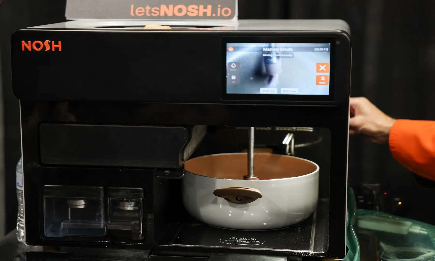 The Nosh AI Cooking Robot is demonstrated during CES Unveiled ahead of the Consumer Electronics Show (CES) in Las Vegas, Nevada on January 4, 2026. &mdash; Patrick T. Fallon / AFP