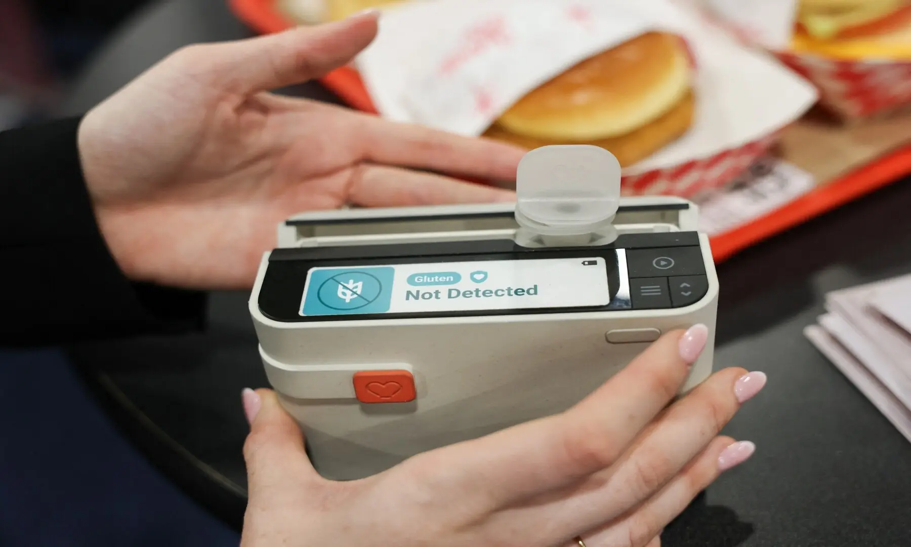 A model of the Allergen Alert mini lab for the portable testing of food for allergens including gluten and milk is displayed during CES Unveiled ahead of the Consumer Electronics Show (CES) in Las Vegas, Nevada on January 4, 2026. &mdash; Patrick T. Fallon / AFP