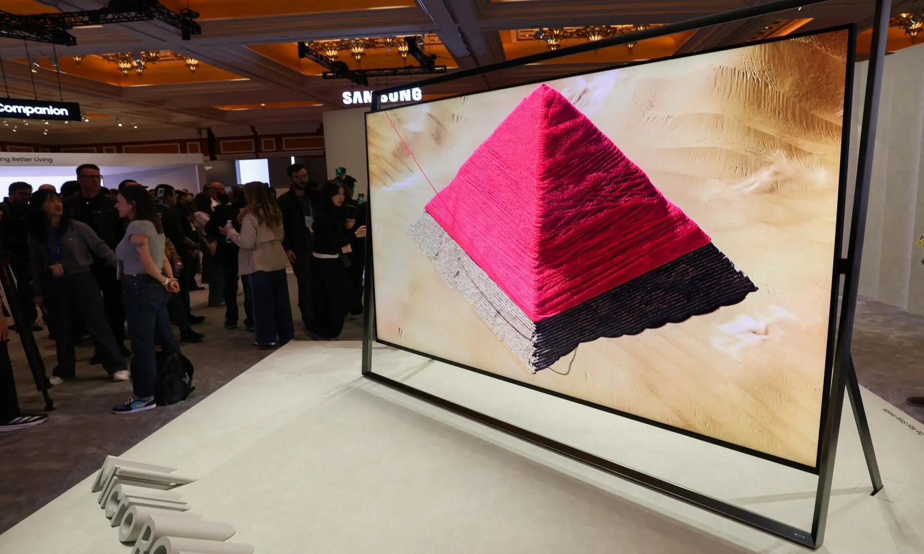 Attendees view the Samsung Micro RGB 130-inch TV after it was unveiled during the Samsung Electronics First Look event ahead of the Consumer Electronics Show (CES) in Las Vegas, Nevada on January 4, 2026. &mdash; Patrick T. Fallon / AFP