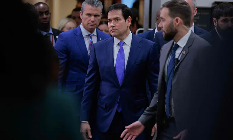 US Secretary of War Pete Hegseth (L) and Secretary of State Marco Rubio move in between closed-door briefings with members of Congress on Venezuela at the US Capitol in Washington, DC, the US on January 7. &mdash; AFP