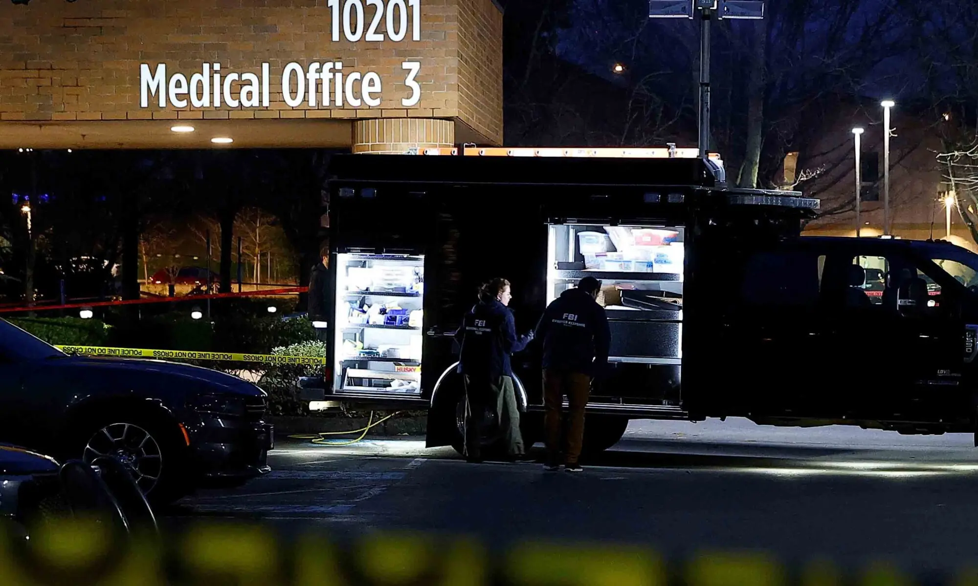 FBI agents work next to an evidence truck outside Adventist Hospital after U.S. federal agents shot two people in Portland, Oregon, US, January 8, 2026. &mdash; Reuters