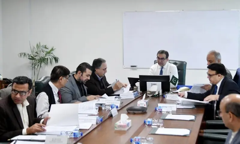 Adviser to the Prime Minister on Privatisation Muh&shy;ammad Ali chairs a meeting of the Privatisation Commission board on Friday. &mdash; PID