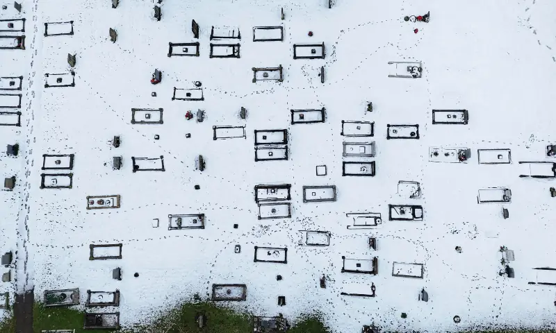 A drone view shows a cemetery covered in snow in Lichfield, after Storm Goretti&rsquo;s arrival amid a week of plunging temperatures, in Britain on January 9, 2026. &mdash; Reuters