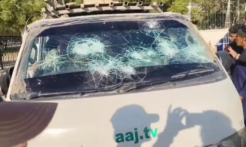  A vehicle of Aaj News with a badly damaged windshield. &mdash; screengrab from video via Imtiaz Ali 