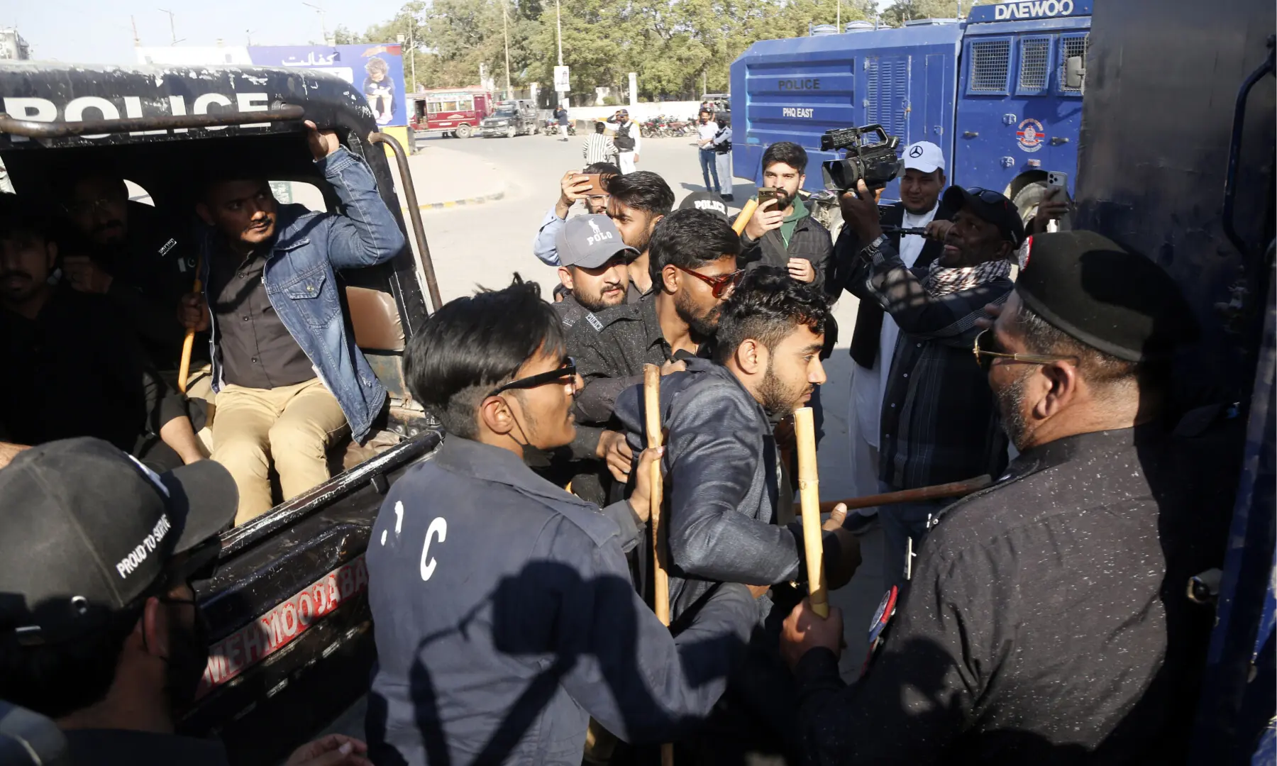 Police baton-charge a crowd gathered near Numaish Chowrangi, Karachi ahead of a PTI rally, on Jan 11, 2026. &mdash; Shakil Adil/White Star