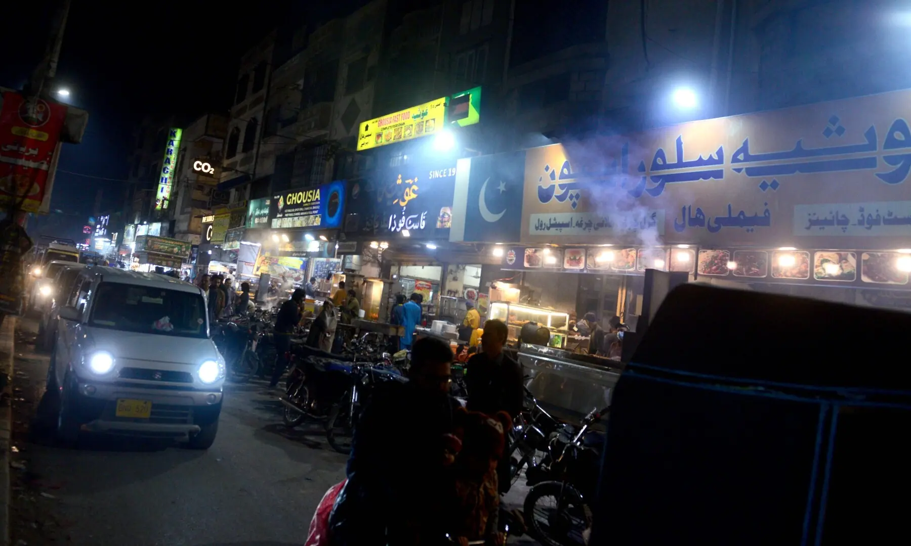A view of the food outlets at Hussainabad Food Street, bustling with vendors and diners enjoying a mix of traditional and contemporary street eats. &mdash; Tahir Jamal/White Star