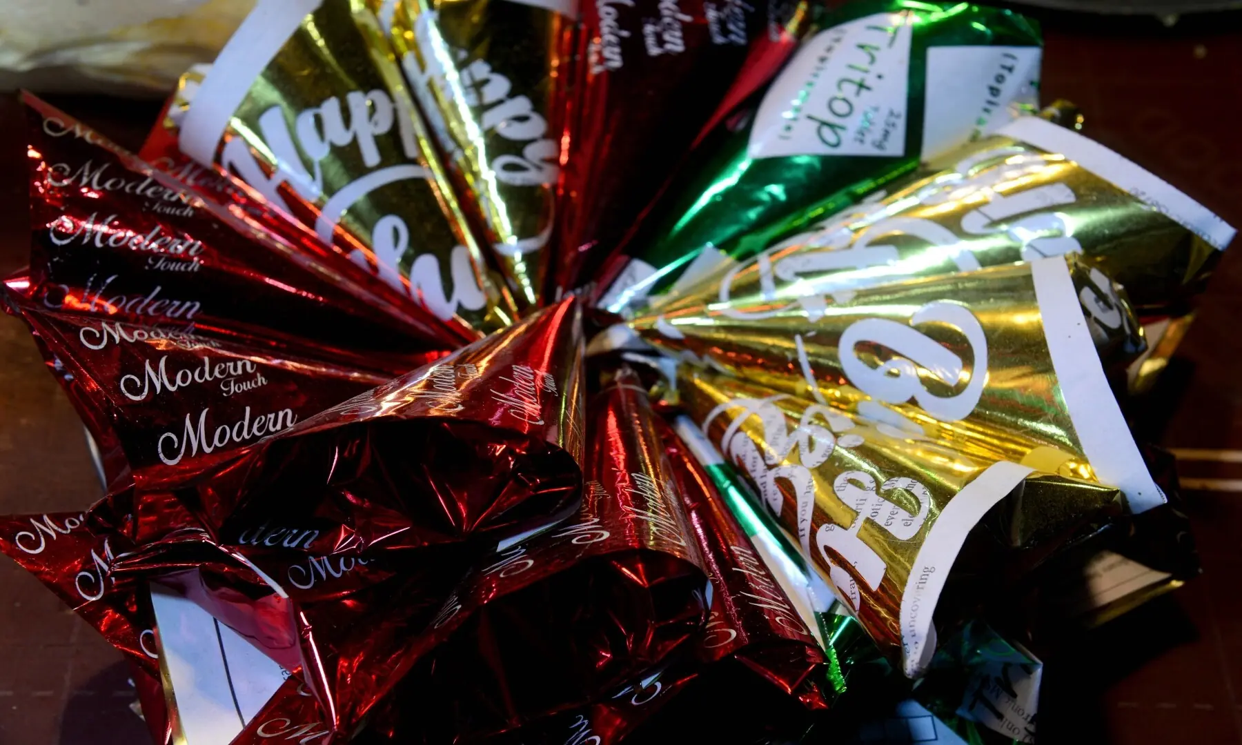 A variety of paan neatly lined up in colourful wrappers at a kiosk in Hussainabad, reflecting Karachi&rsquo;s vibrant paan culture and its enduring place in the city&rsquo;s street life. &mdash; Tahir Jamal/White Star