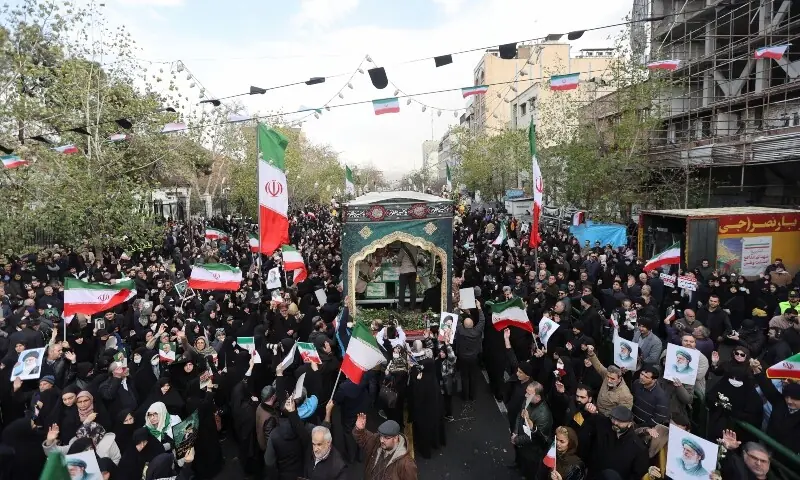 People attend the funeral of the security forces who were killed in the protests that erupted over the collapse of the currency’s value in Tehran, Iran, January 14. — Reuters People attend the funeral of the security forces who were killed in the protests that erupted over the collapse of the currency’s value in Tehran, Iran, January 14. — Reuters