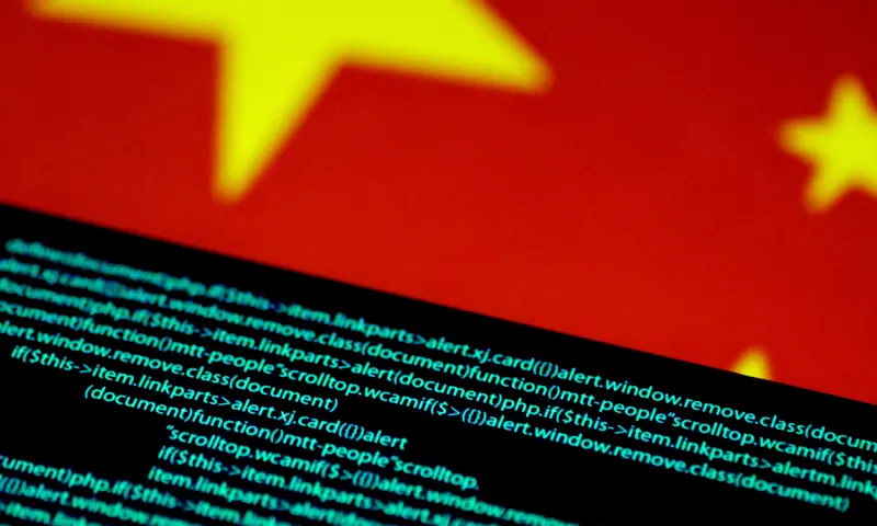 Computer code is seen on a screen above a Chinese flag in this July 12, 2017 illustration photo. &mdash; Reuters/File