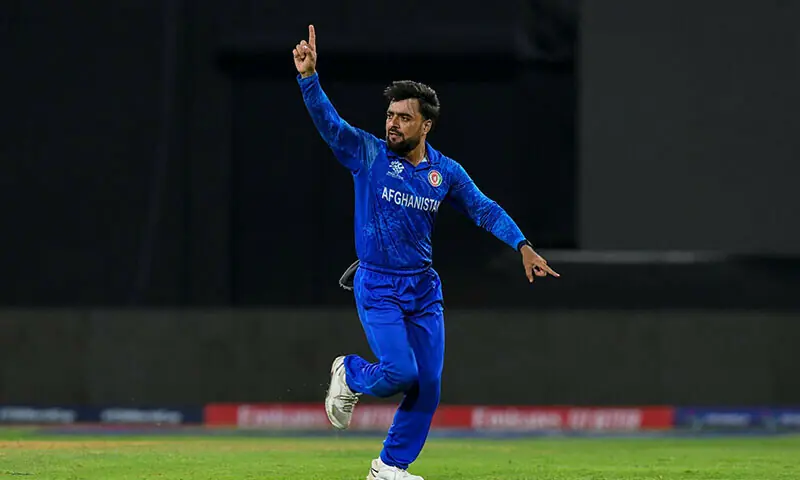 Afghanistan&rsquo;s captain Rashid Khan (R) celebrates the dismissal of Bangladesh&rsquo;s Soumya Sarkar during the ICC men&rsquo;s Twenty20 World Cup 2024 Super Eight cricket match between Afghanistan and Bangladesh at Arnos Vale Stadium in Arnos Vale, Saint Vincent and the Grenadines on June 24, 2024. &mdash; AFP/File