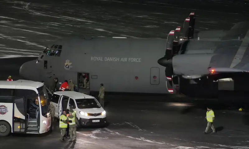 A Royal Danish Air Force plane carrying personnel in military fatigues lands at Nuuk airport Greenland, January 14, 2026. &mdash;REUTERS