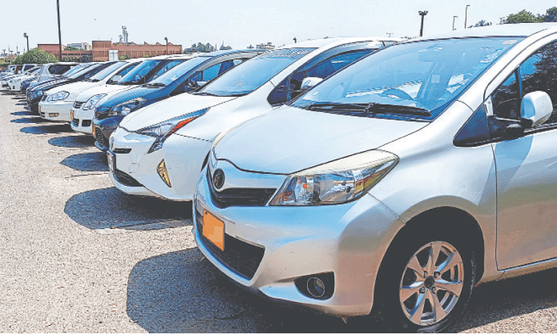 Undated image shows parked cars.&mdash;APP/file