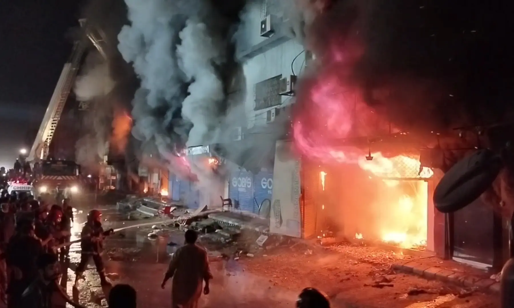 Firefighters and rescue workers make efforts to douse a fire at the Gul Plaza shopping mall on Karachi’s MA Jinnah Road in the early hours of Jan 18, 2026. — Shakil Adil/White Star