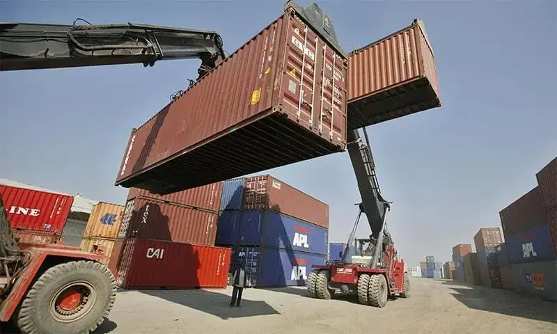 A file photo of shipping containers being lifted.
&mdash; Reuters/File