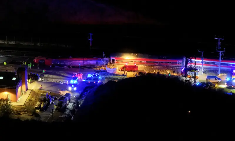 A drone view shows emergency services at work at the site of a deadly train derailment, after a high-speed train derailed and collided with another oncoming train near Adamuz, in Cordoba province, Spain on January 19, 2026. &mdash; Reuters