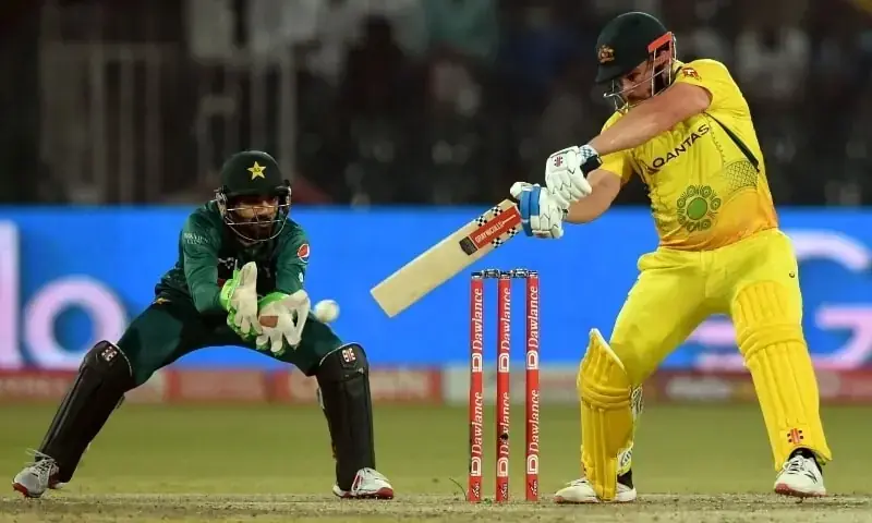 Australia&rsquo;s captain Aaron Finch (R) plays a shot as Pakistan&rsquo;s wicketkeeper Mohammad Rizwan watches during the Twenty20 international cricket match between Pakistan and Australia at the Gaddafi Cricket Stadium in Lahore on April 5. &mdash; AFP