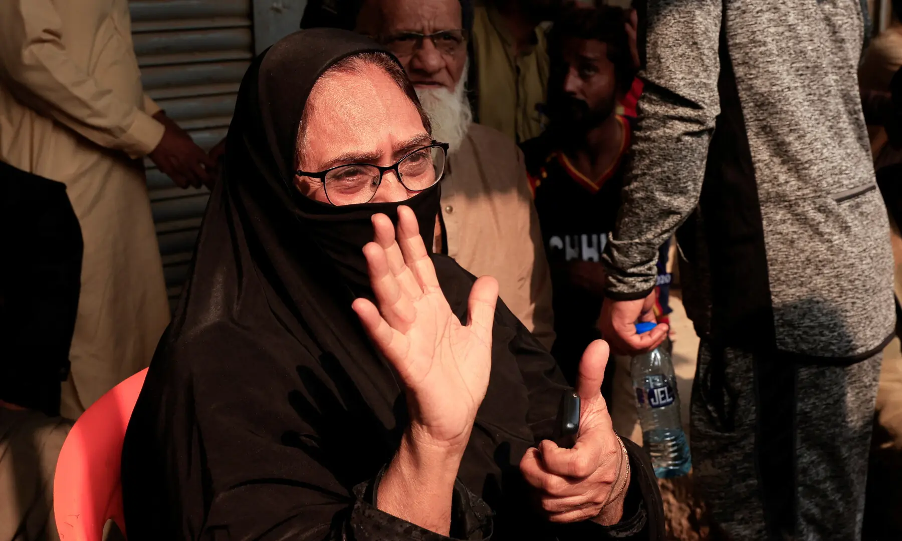 A woman speaks to reporters (not pictured) as she mourns six missing family members who were shopping at Gul Plaza Shopping Centre for a wedding ceremony, on Jan 19, 2026. — Reuters