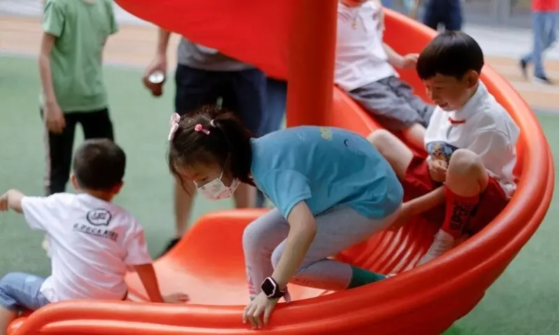 Children play at a playground inside a shopping complex in Shanghai, China, June 1, 2021. &mdash; Reuters/File
