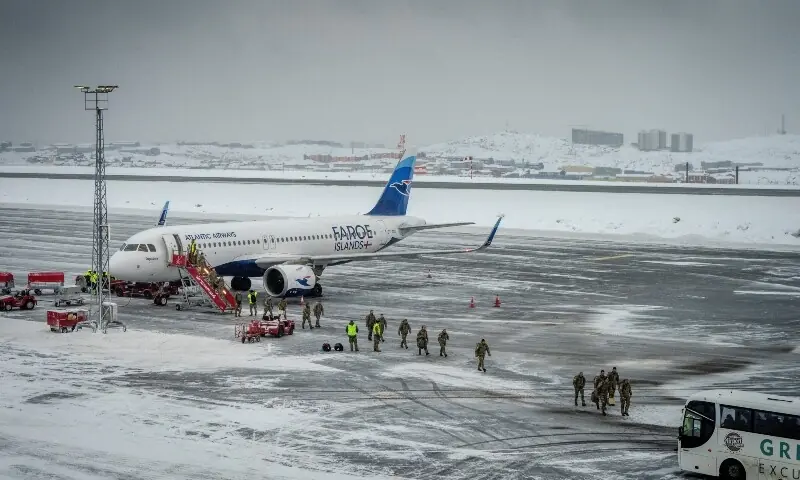 Danish soldiers land at Nuuk airport, January 19. &mdash; Reuters