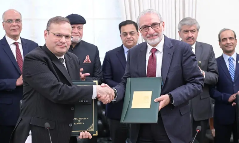 Secretary of the Ministry of Economic Affairs Muhammad Humair Karim and Islamic Development Bank Vice President Dr Rami Ahmad sign loan agreements worth $603m to finance three projects, in Islamabad on January 20. &mdash; PID