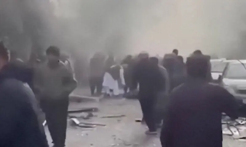 People gather amid smoke near the site following a blast at a Chinese-run restaurant, in Kabul, Afghanistan, January 19, 2026 in this screengrab taken from a handout video. TOLOnews via Facebook. &mdash; Reuters