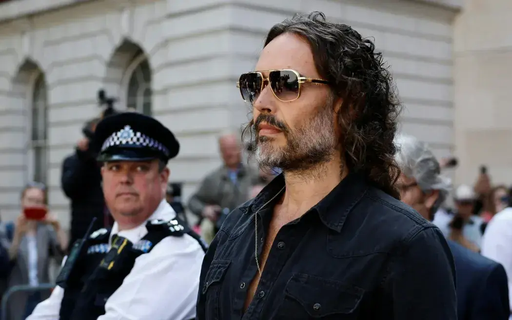 Comedian Russel Brand appears in UK court over two charges of rape