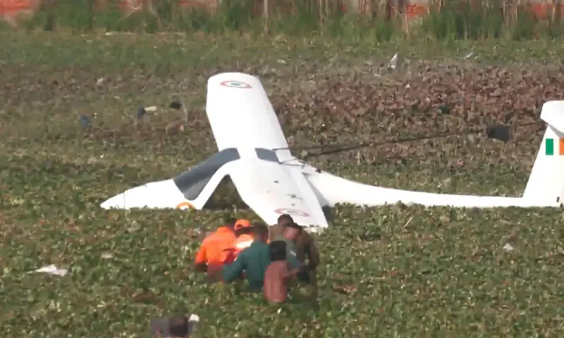 Rescuers approach an Indian Air force Microlite aircraft that crashed in India&rsquo;s Uttar Pradesh state on January 21. &mdash; Screengrab via X/@ANI