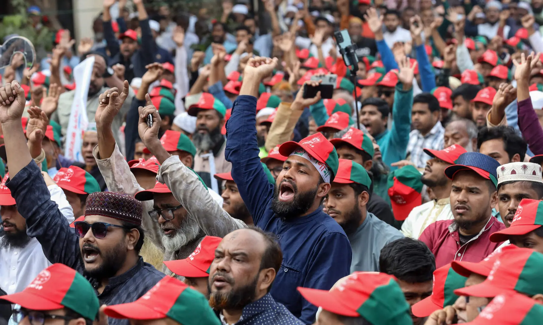 Bangladesh&rsquo;s Jamaat-i-Islami supporters shout slogans during a campaign rally ahead of the upcoming national elections in Mirpur on Jan 22, 2026. &mdash; AFP