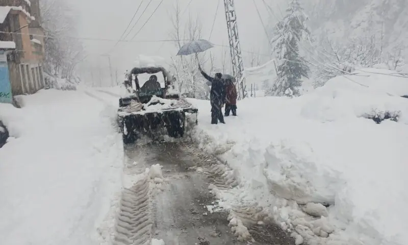 Heavy machinery is used to clear a road in Khyber Pakhtunkhwa amid heavy snowfall on January 23, 2026. —Photo by Umar Bacha Heavy machinery is used to clear a road in Khyber Pakhtunkhwa amid heavy snowfall on January 23, 2026. —Photo by Umar Bacha