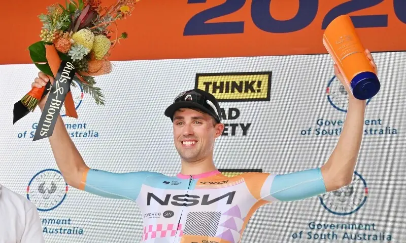 NSN Cycling Team’s British rider Ethan Vernon celebrates at the podium after winning stage four of the Tour Down Under UCI men’s cycling race in Adelaide on January 24. — AFP NSN Cycling Team’s British rider Ethan Vernon celebrates at the podium after winning stage four of the Tour Down Under UCI men’s cycling race in Adelaide on January 24. — AFP