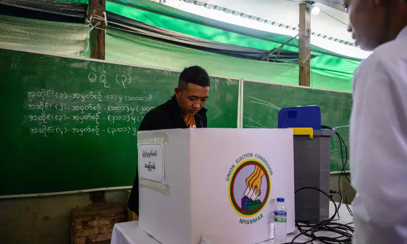 A voter casts his ballot at a polling station during the third and final phase of Myanmar’s general election in Mandalay on Jan 25, 2026. — AFP