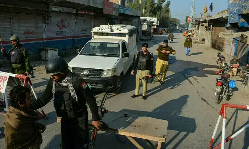 Police stand guard along a road they blocked after militants seized a police station in Bannu on December 19, 2022. Used for representation only. &mdash; AFP/File Photo