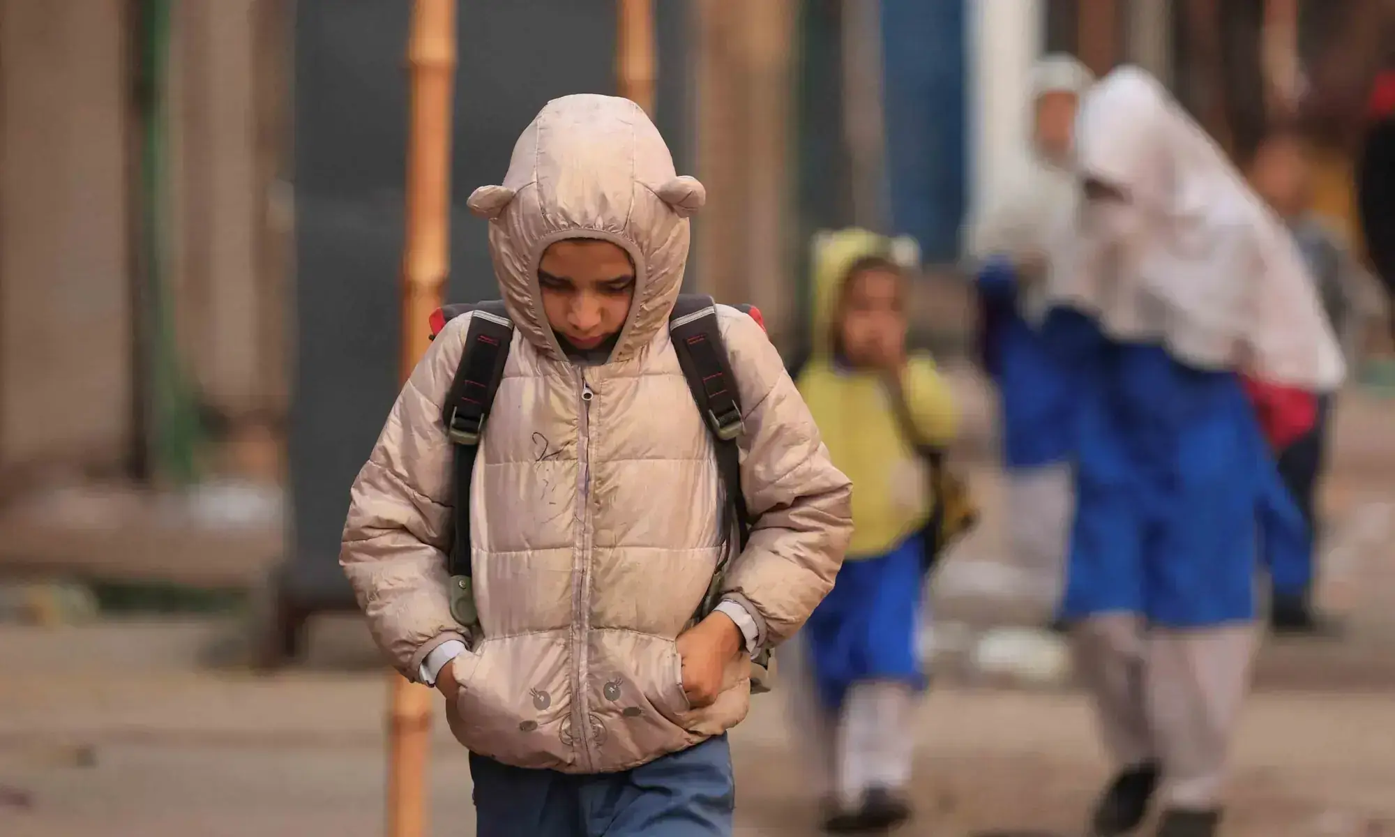 A child walks to school on a cold winter morning in Karachi, on January 2, 2026. &mdash; Reuters